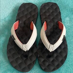 REEF Brown and White Flip Flops with orange Accents